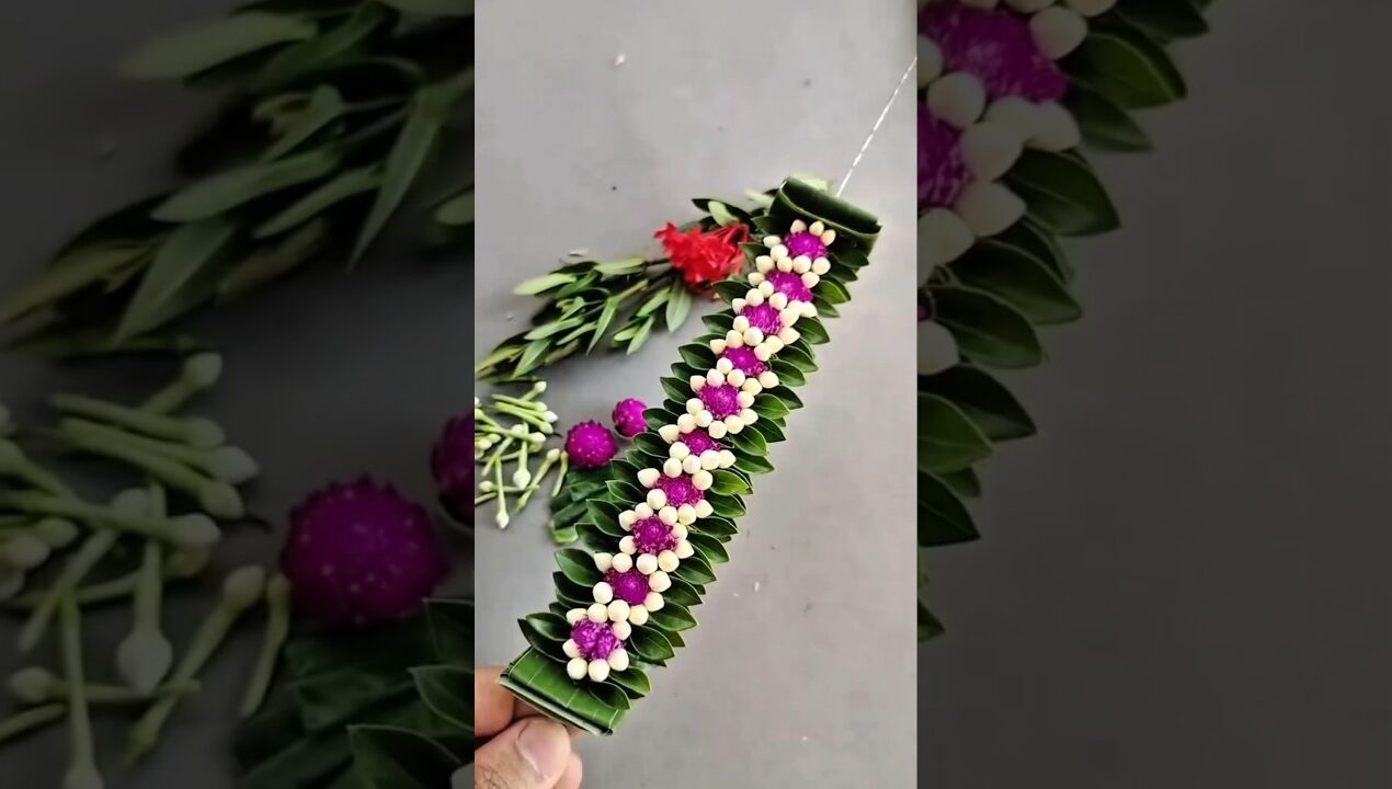 Arranging flowers and leaves together as one #handicrafts #leafart #flowerart #diy