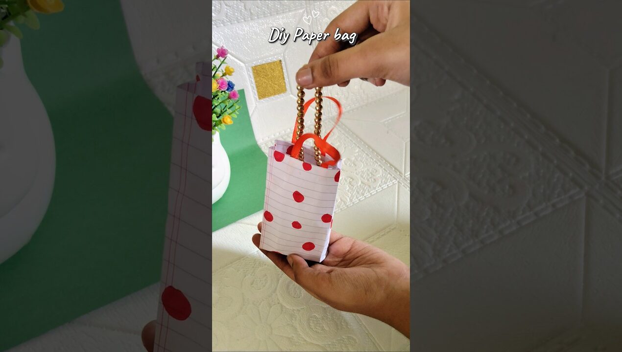 Diy Paper bag 🛍️✨ cute paper craft #diy #craft #gift #art #shorts #youtubeshorts #papercraft #cute