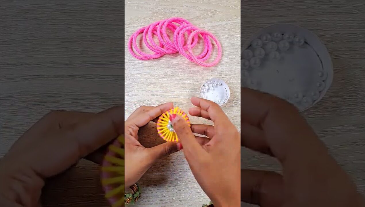 I made a unique wall hanging with bangles and glitter paper #shortsfeed #facts #craft #Lifestyle